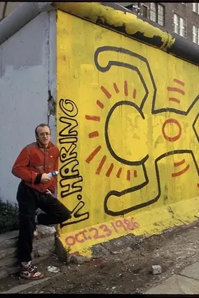 Keith Haring posed an der Berliner Mauer 2